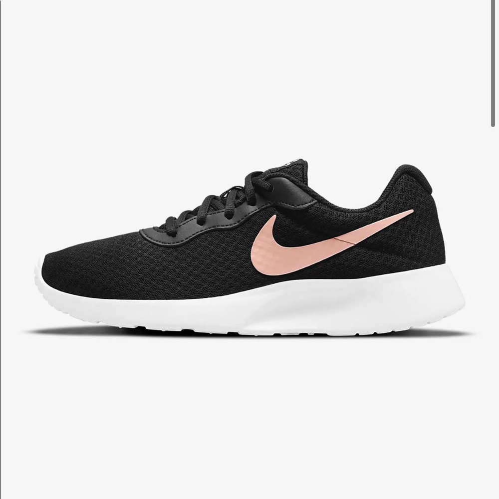 Black and rose gold Nike running shoes